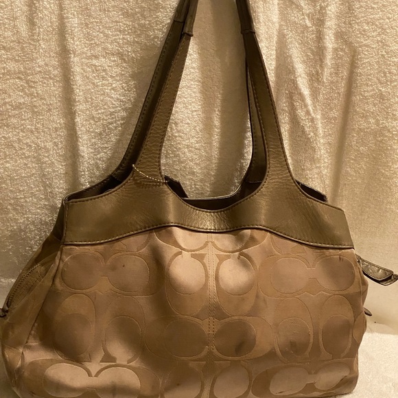 Coach signature purse has lots of pockets still in good condition. - Picture 2 of 11